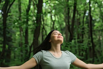 Naklejka premium Serene Woman in Green Forest