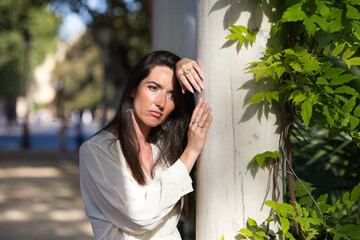young and beautiful latin woman is sad and angry and depressed because of different problems, she...