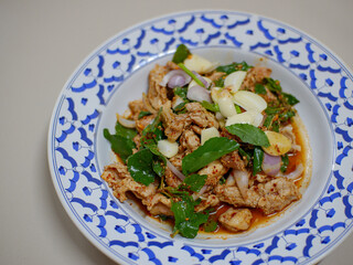 Spicy pork salad with vegetables, Asian style food. Thailand