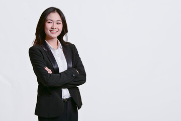 Obraz premium Beautiful Asian businesswoman with her work clothes