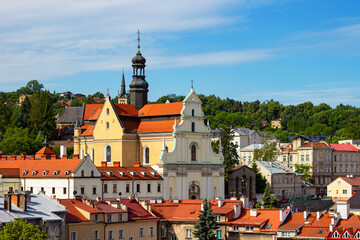 Fototapeta premium Baroque Carmelite Church and Monastery at old town of Przemyśl, Poland. Top view from Clock Tower of Museum of Bells and Pipes