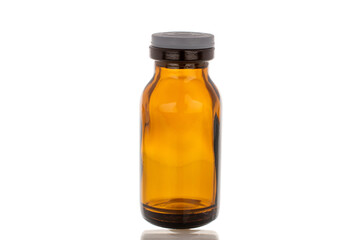 Glass medicine jar isolated on white background.