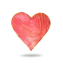 Piece of cold smoked tuna in the shape of heart close up isolated on a white background