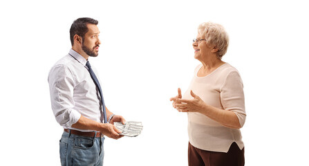 Fototapeta premium Businessman borrowing money from an elderly woman