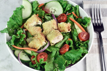  chicken salad  with cucumbers, tomatoes and onions