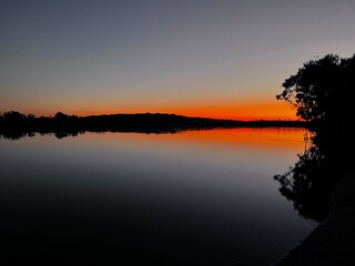 Naklejka premium sunset on the river