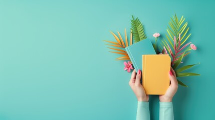 A close-up of hands holding colorful storybook illustrations against a plain background, symbolizing the art of storytelling and narrative creation.