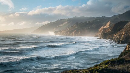 Obraz premium Wide view of a coastline with waves crashing.