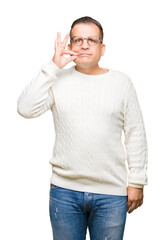 Fototapeta premium Middle age arab man wearing glasses over isolated background mouth and lips shut as zip with fingers. Secret and silent, taboo talking