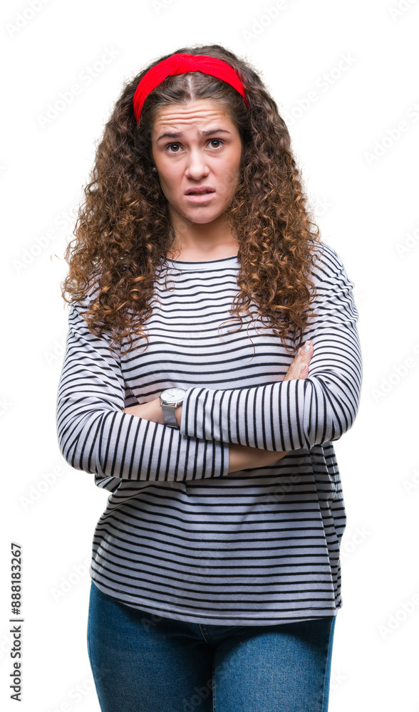 Sticker beautiful brunette curly hair young girl wearing stripes sweater over isolated background skeptic an