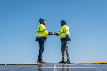 The engineer installs the solar panel, promoting the clean energy concept.