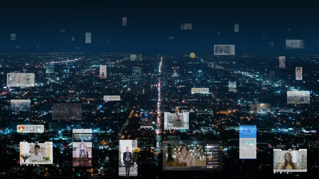 Aerial View from Griffith Observatory of Los Angeles California. Traffic Lights and City Lights. Social Media Interface and Videos Appearing. People with Technology Devices.