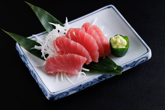 Tuna sashimi isolated in black background