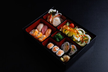 bento sushi set japanese food isolate in black background