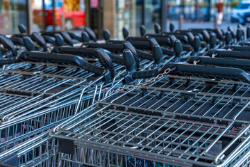 Shopping carts in front of a hypermarket