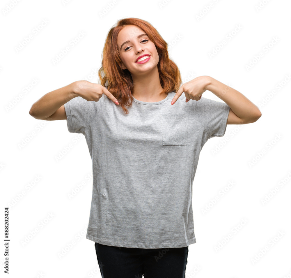 Wall mural young beautiful woman over isolated background looking confident with smile on face, pointing onesel