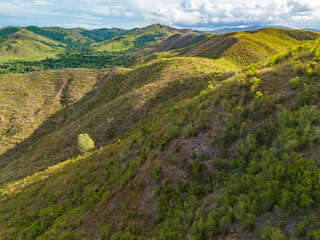 Beautiful Aerial View of Green Grass Hill in Buru Island, Maluku, Indonesia