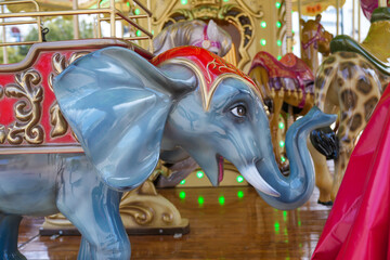 Cute elephant seat on carousel ride