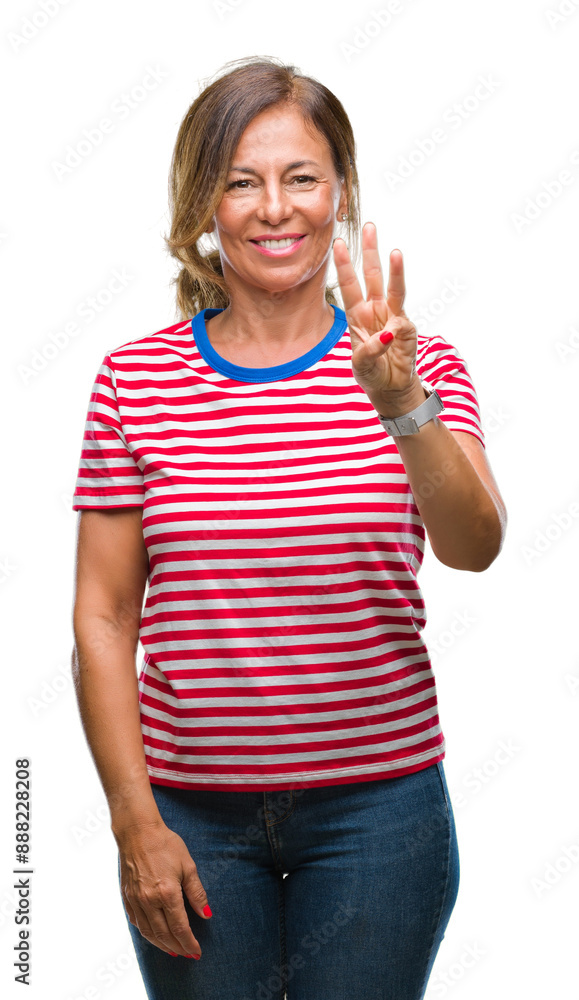 Wall mural middle age senior hispanic woman over isolated background showing and pointing up with fingers numbe