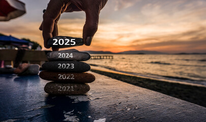Happy new year 2025 replace old 2024. New Year 2025 is coming concept idea on orange sky. High...