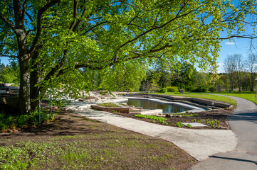 View of the pond by the mountain garden in the Tallinn Botanical Garden. Estonia.