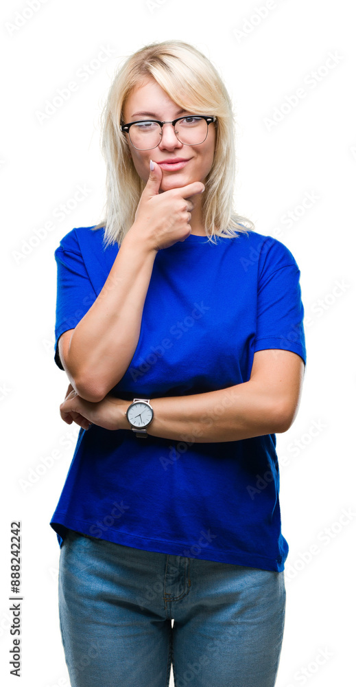 Canvas Prints Young beautiful blonde woman wearing glasses over isolated background looking confident at the camera with smile with crossed arms and hand raised on chin. Thinking positive.