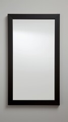 Simple black-framed mirror reflecting light minimalistic modern interior