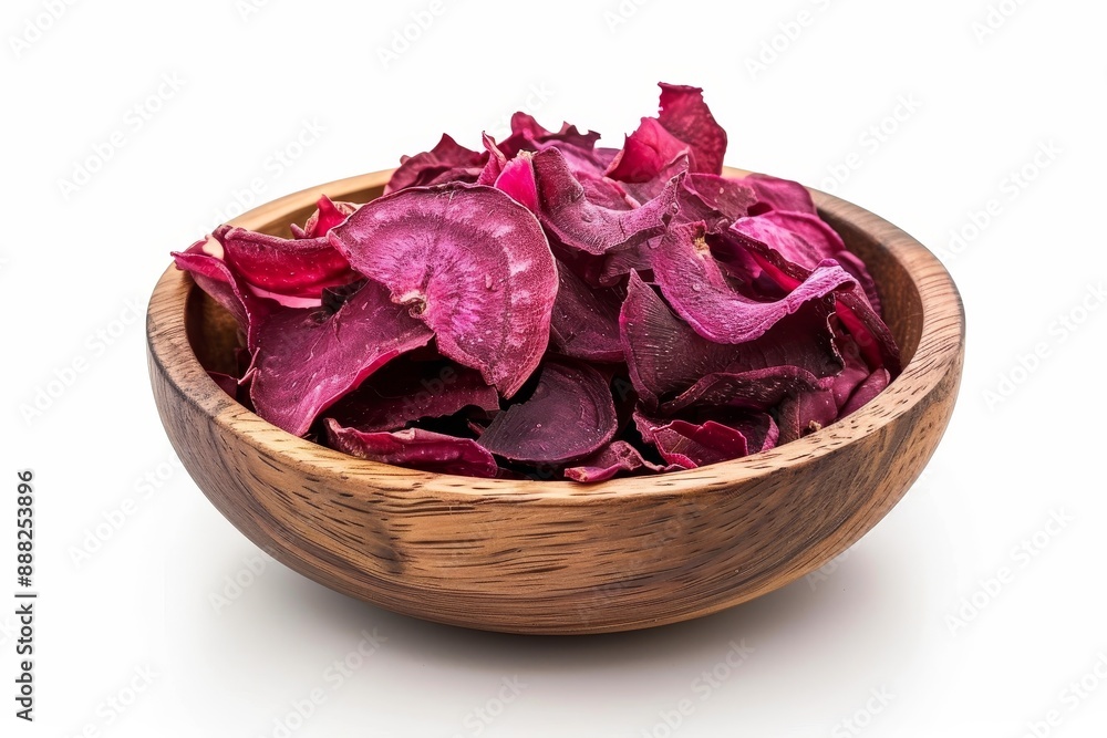 Sticker dehydrated beet chips in wooden bowl on white background