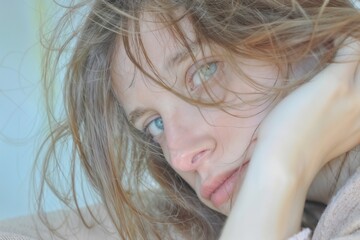 Woman with Messy Hair Looking at Camera