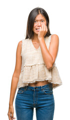 Obraz premium Young asian woman over isolated background looking stressed and nervous with hands on mouth biting nails. Anxiety problem.