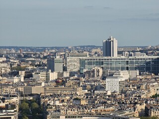 Paris, France - April 12, 2024: Aerial view of Paris skyline with dense urban sprawl and modern...