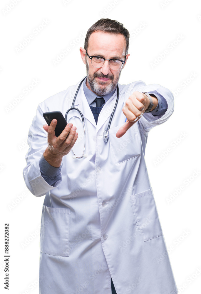 Canvas Prints Middle age senior hoary doctor man texting using smartphone over isolated background with angry face, negative sign showing dislike with thumbs down, rejection concept