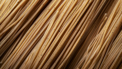 Uncooked buckwheat noodles (soba) as background, top view