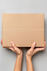 Hands holding a large cardboard cosmetic box. Top view product photo taken under professional studio lighting, with high resolution and sharp focus to show high detail. Generative AI tools
