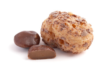 Crunchy Freeze Dried Milk Chocolate Covered Caramel Disks Isolated on White Background