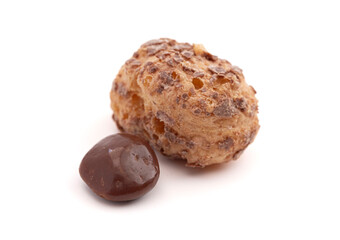 Crunchy Freeze Dried Milk Chocolate Covered Caramel Disks Isolated on White Background