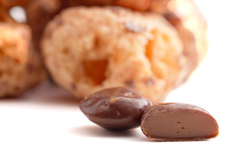 Crunchy Freeze Dried Milk Chocolate Covered Caramel Disks Isolated on White Background
