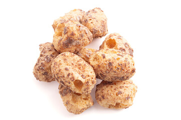 Crunchy Freeze Dried Milk Chocolate Covered Caramel Disks Isolated on White Background
