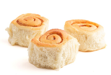 Unfrosted Homemade Bready Cinnamon Roll Buns Isolated on a White Background