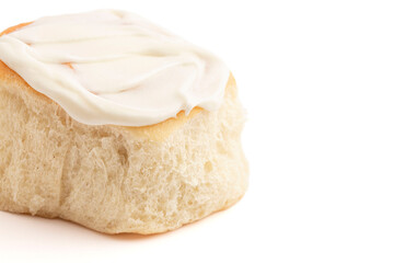 Iced Homemade Bready Cinnamon Roll Buns Isolated on a White Background