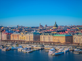 Fototapeta premium Stockholm old town - Ostermalm, next to Gamla stan. Aerial view of Sweden capital. Drone top panorama photo