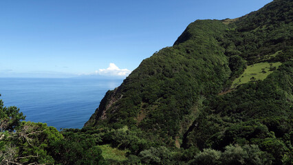 View of the hiking trail starting in Serra do Topo - Caldeira Santo Cristo - Fajã dos Cubres in São Jorge island, Azores, Portugal.