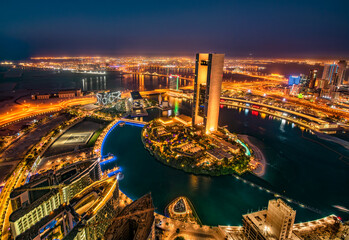 Enchanting night cityscapes of Manama, Bahrain, with its illuminated skyline, modern architecture, and vibrant nightlife. Perfect for travel enthusiasts seeking a glimpse of this Middle Eastern gem