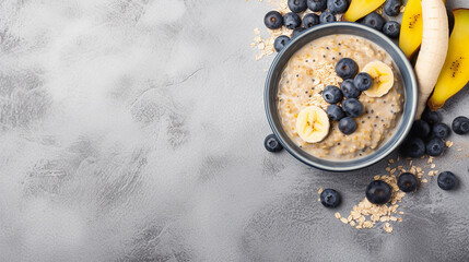 Breakfast Oatmeal Porridge with Banana and Blueberries