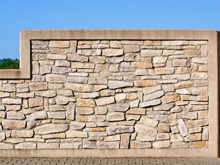 Natural stone wall for flood protection along the Elbe - Flood protection wall is made of concrete and was cast with matrices in a natural stone structure