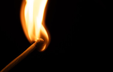 Matches and fire on a black background