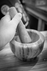 a close-up of a mortar for crushing spices