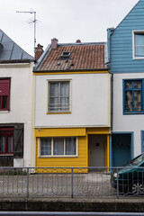 Street view of Amiens: beautiful old houses. Amiens - city and commune in northern France, 120 km north of Paris, capital of Somme department, Hauts-de-France. AMIENS, FRANCE.
