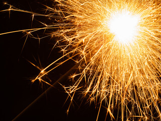A sparkler closeup on black background