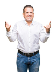 Fototapeta premium Middle age arab elegant man over isolated background shouting with crazy expression doing rock symbol with hands up. Music star. Heavy concept.